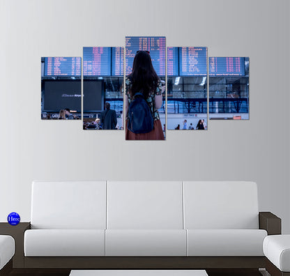 Solo Traveler Beneath an Airport Departure Board