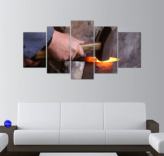 Blacksmith Forging Hot Steel on an Anvil With Hammer