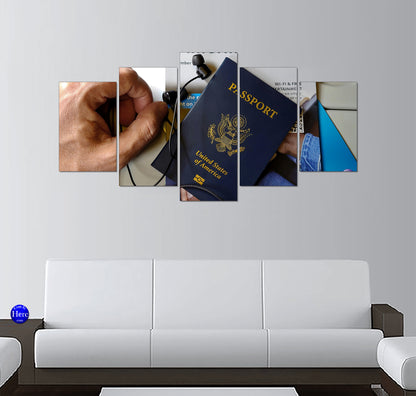 United States Passport with Headphones on Airplane Tray Table