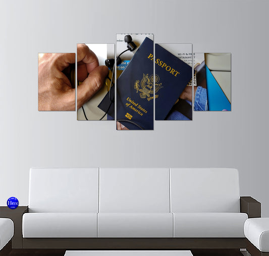 United States Passport with Headphones on Airplane Tray Table