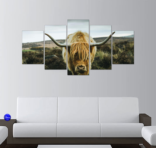 Golden-Blonde Highland Cow on a Windswept Scottish Moor