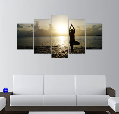 Yoga Tree Pose Silhouette on a Golden Sunrise Beach