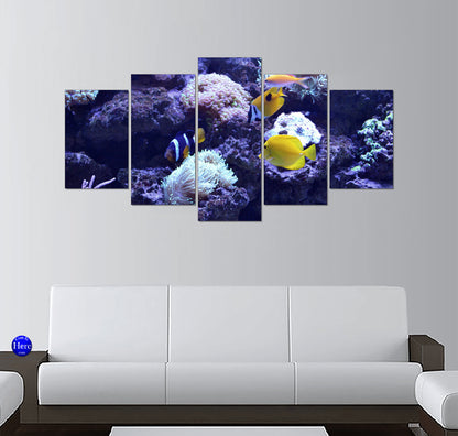 Clownfish and Yellow Tangs in a Tropical Coral Reef