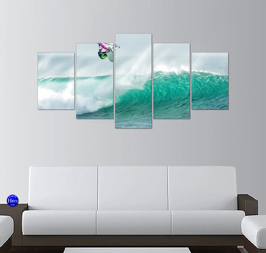 Airborne Windsurfer Flipping Over a Turquoise Big Wave