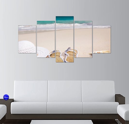 Straw Flip-Flops and Sun Hat on a Sandy Tropical Beach