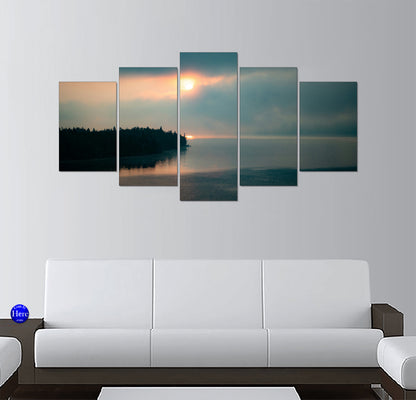 Misty Sunrise Over a Calm Wilderness Lake and Pine Forest