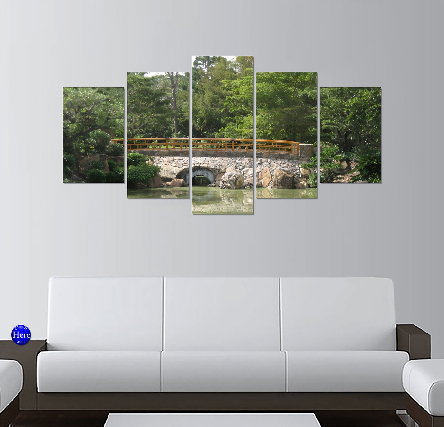 Japanese Garden Stone Bridge With Yellow Railing and Pond Reflection